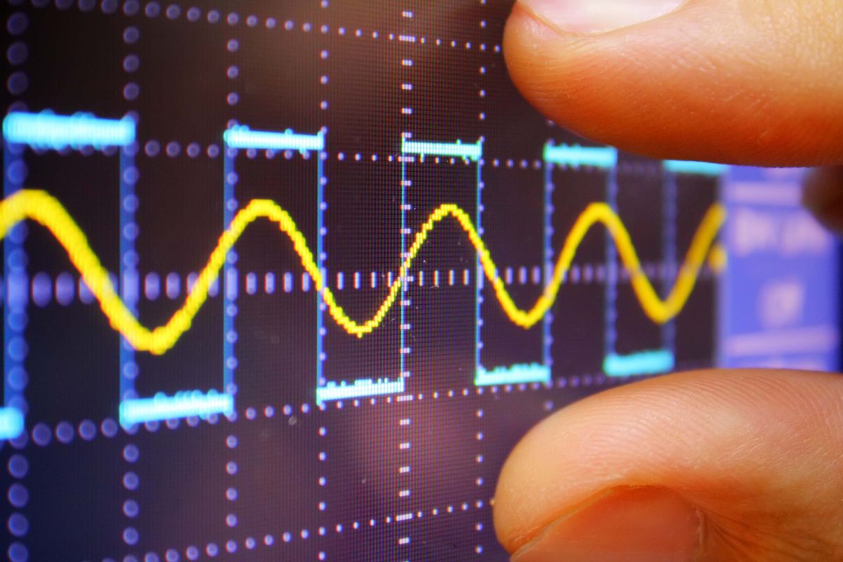 Photo of a sine wave on an oscilloscope